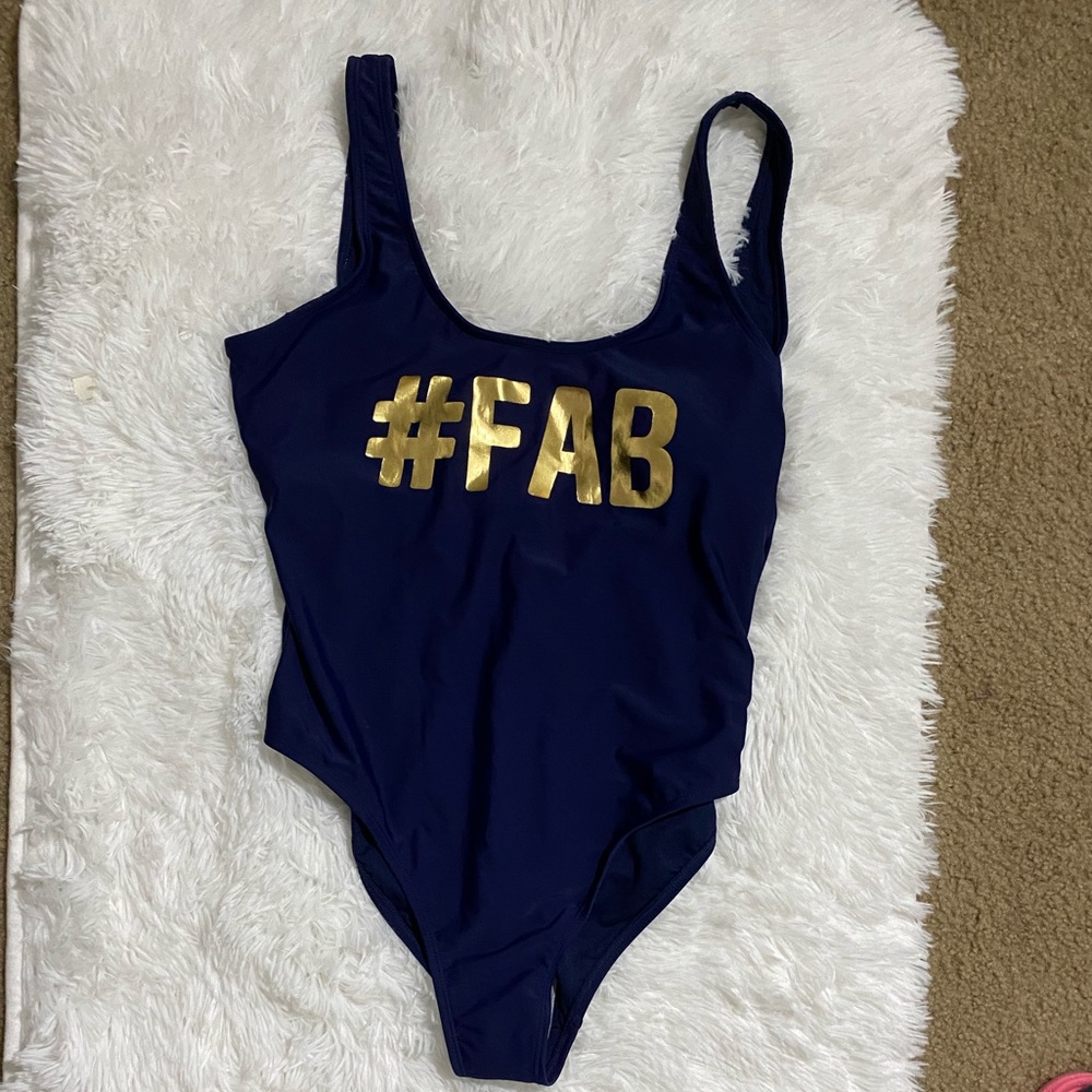 Walmart-Navy blue one piece swimsuit with Gold lettering on front